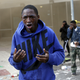 A demonstrator looks up after being sprayed with pepper spray.